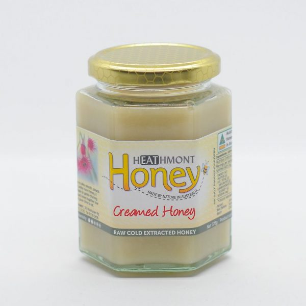 Medium sized glass jar of Creamed Honey